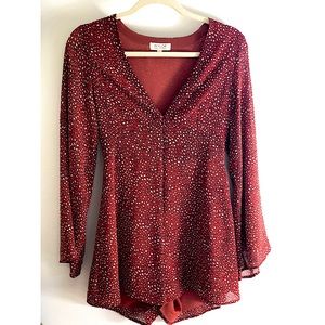 Jumpsuit with long bell sleeves